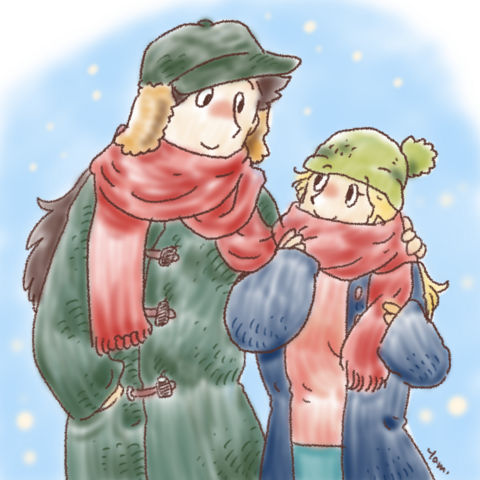 同じマフラーをふたりで巻いてにっこり